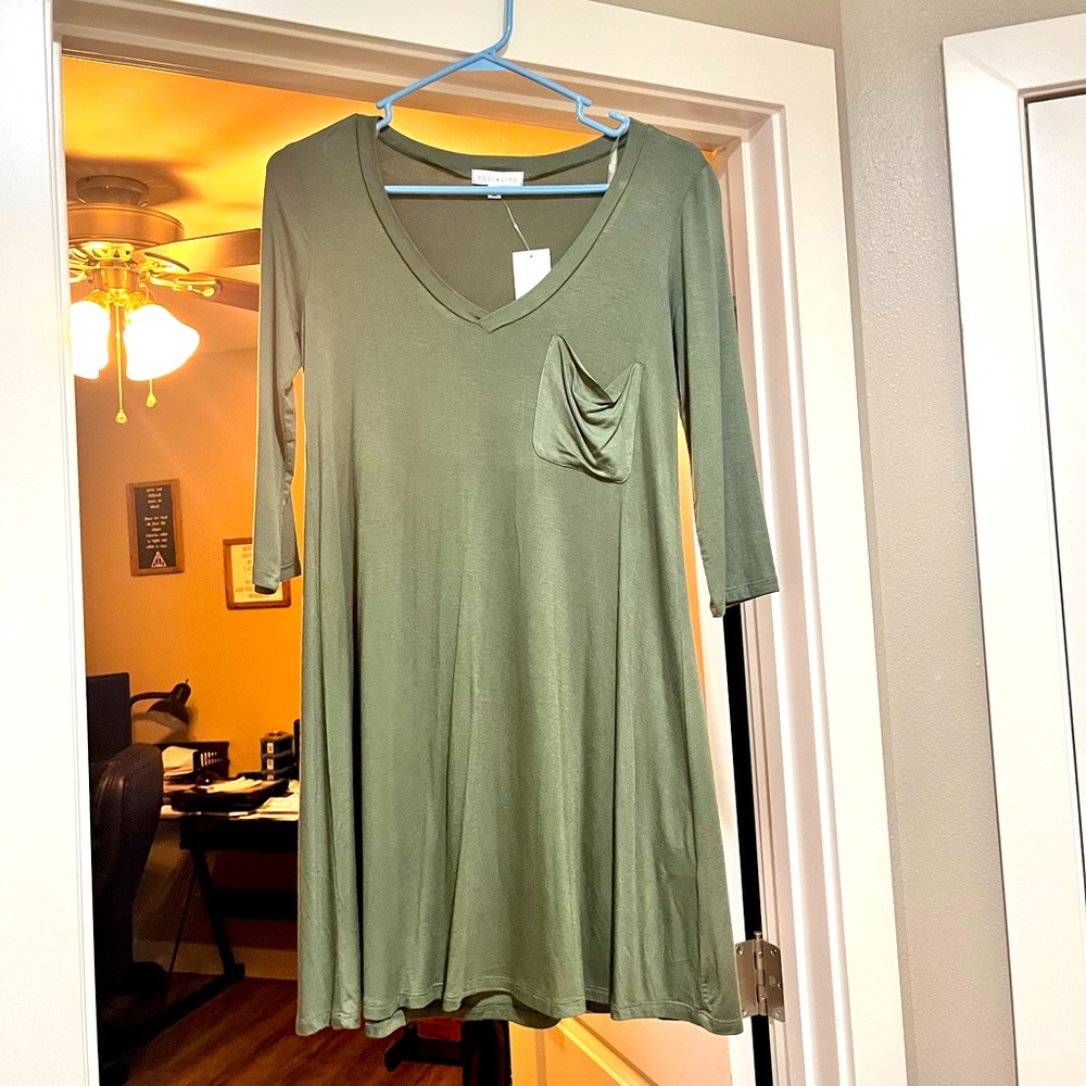 Pocket sage green dress - 3 quarter length sleeves.